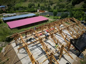 Installation of steel tubes for structural roof support