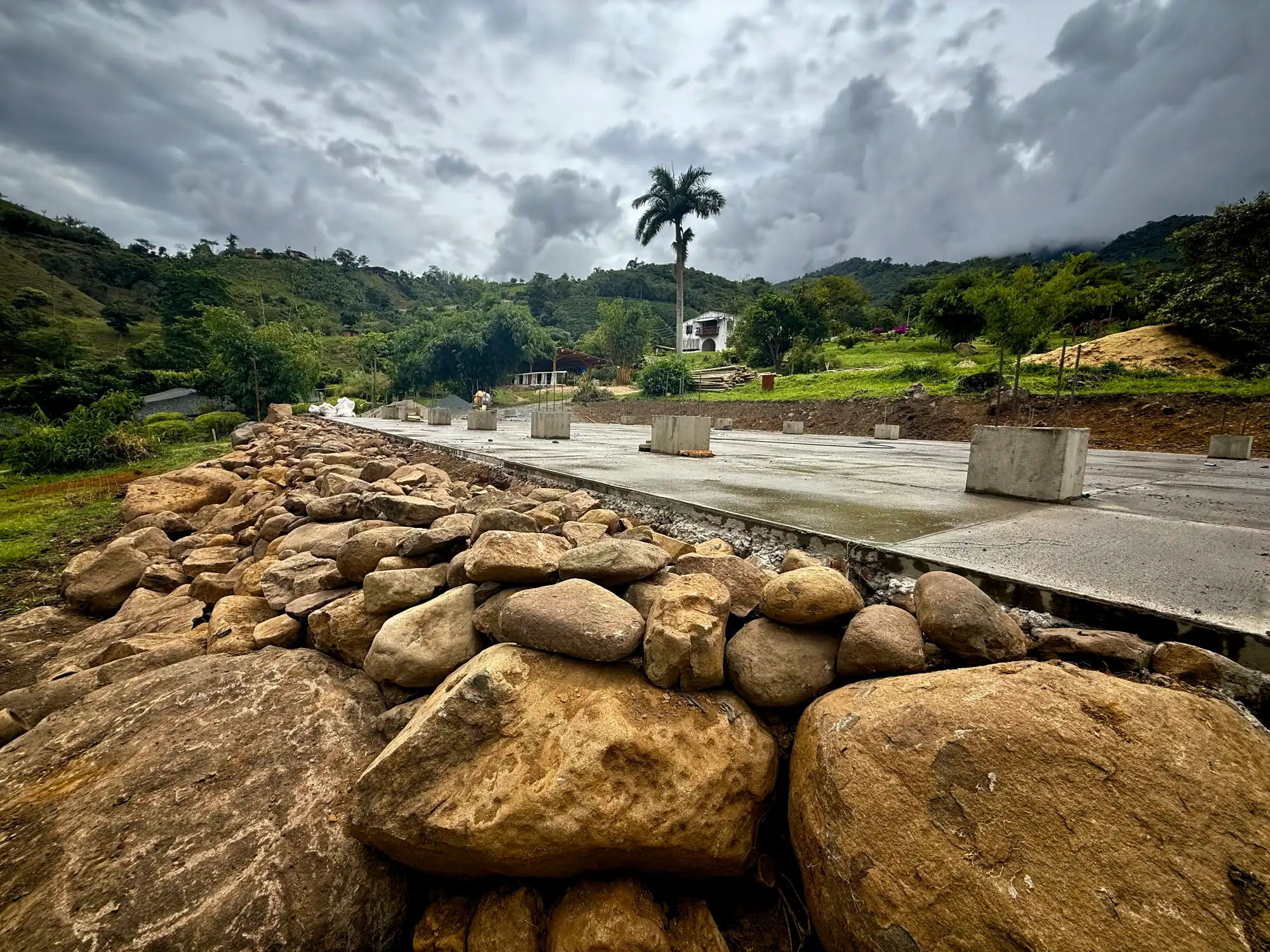 Construction of river stone retaining wall