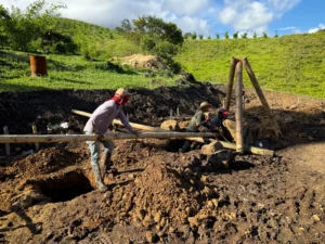 River stone extraction using bamboo tripod and pulley