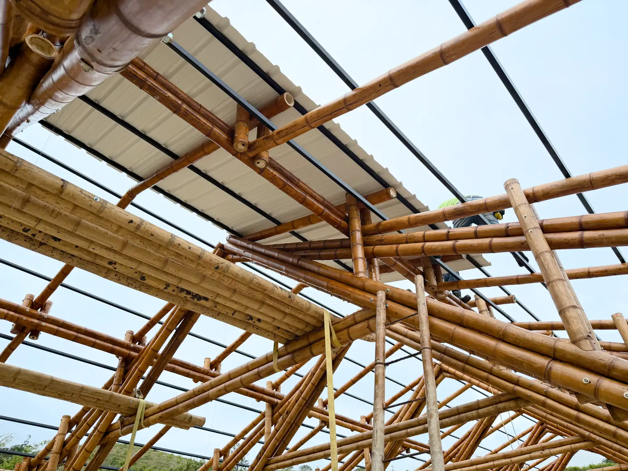 Installation of uPVC roofing panels for the bamboo pavilion