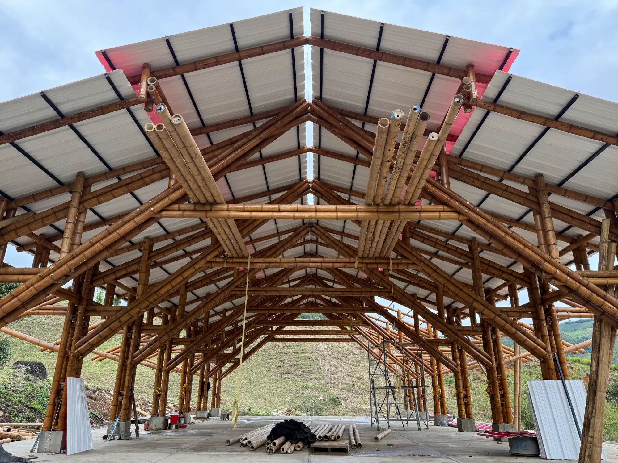 Installation of uPVC roofing panels for the bamboo pavilion