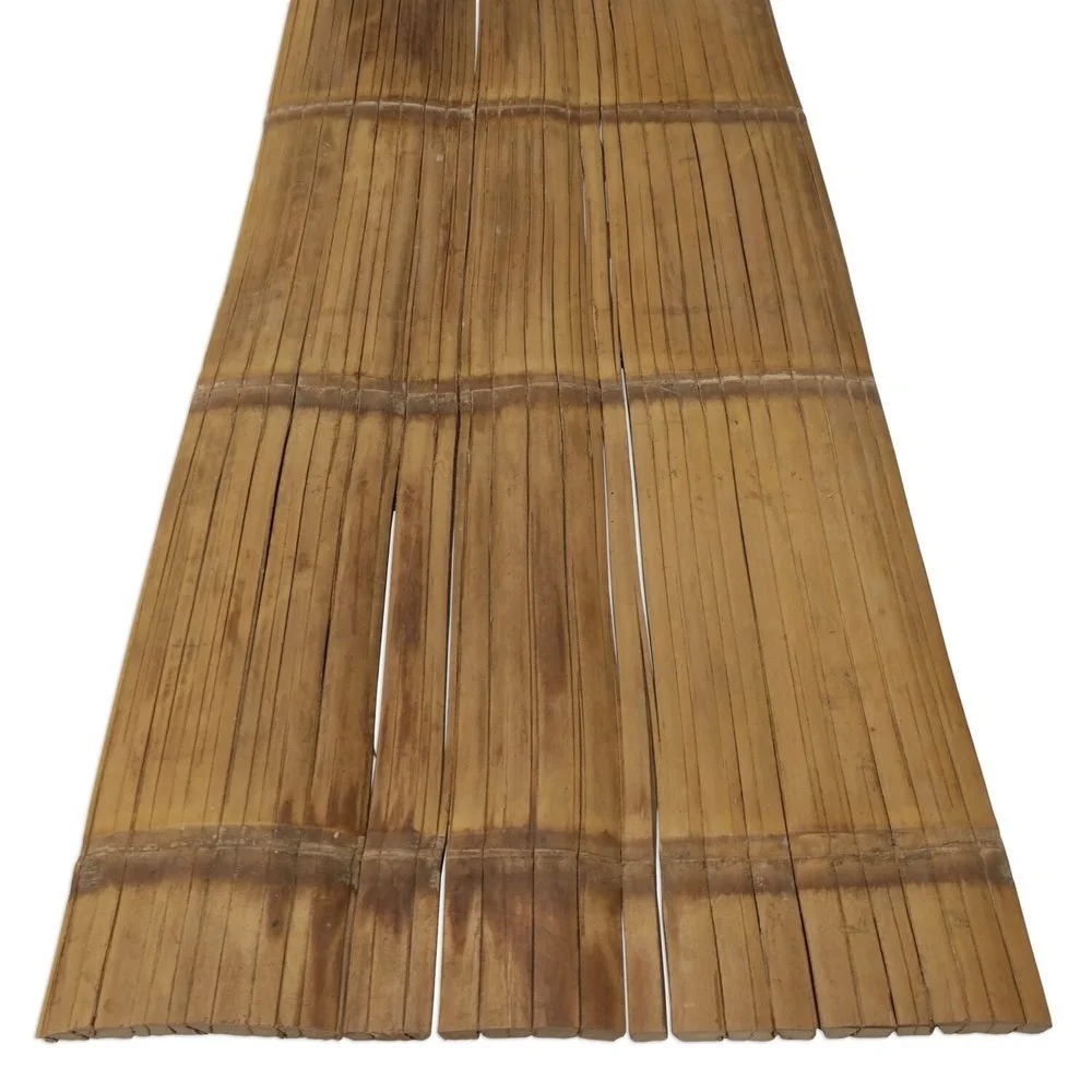 Close-up of woven bamboo mats with horizontal and vertical lines, natural brown color.