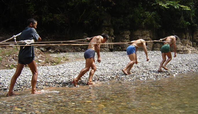Trackers towing boats up the Yangtze river with bamboo cables | Courtesy:  Mitchell Teachers