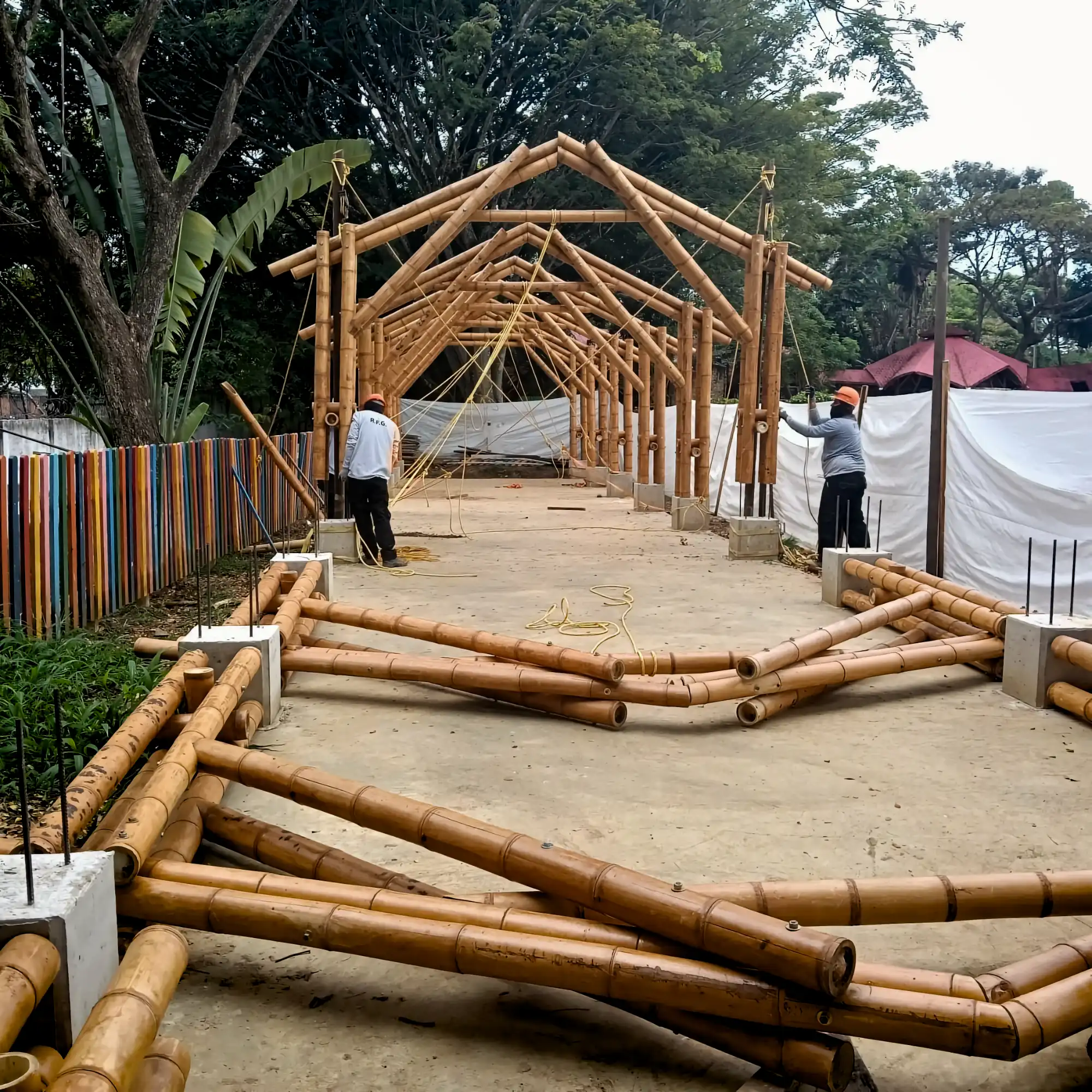 Lifting the prefabricated bamboo structures into position on site