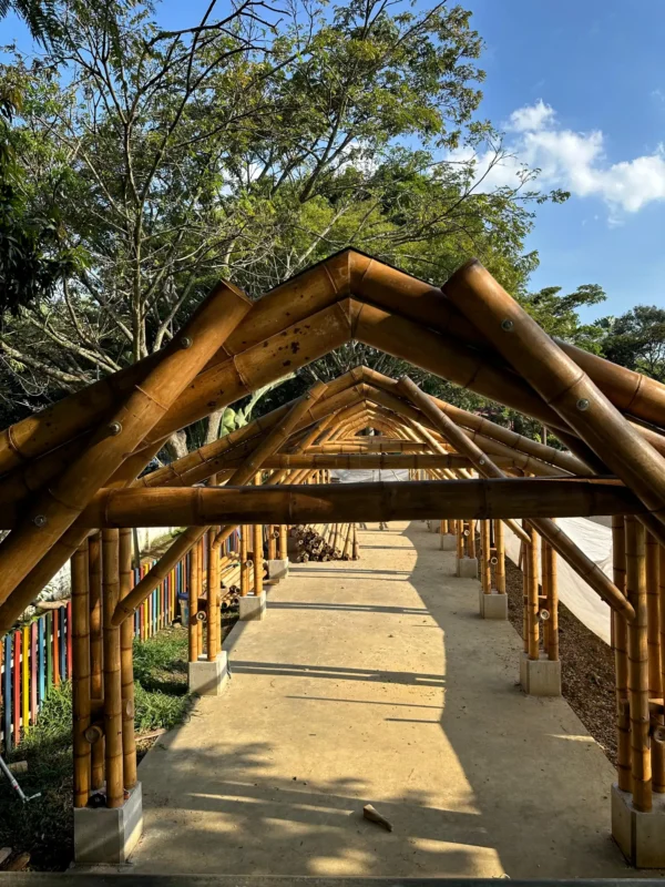 Lifting the prefabricated bamboo structures into position on site