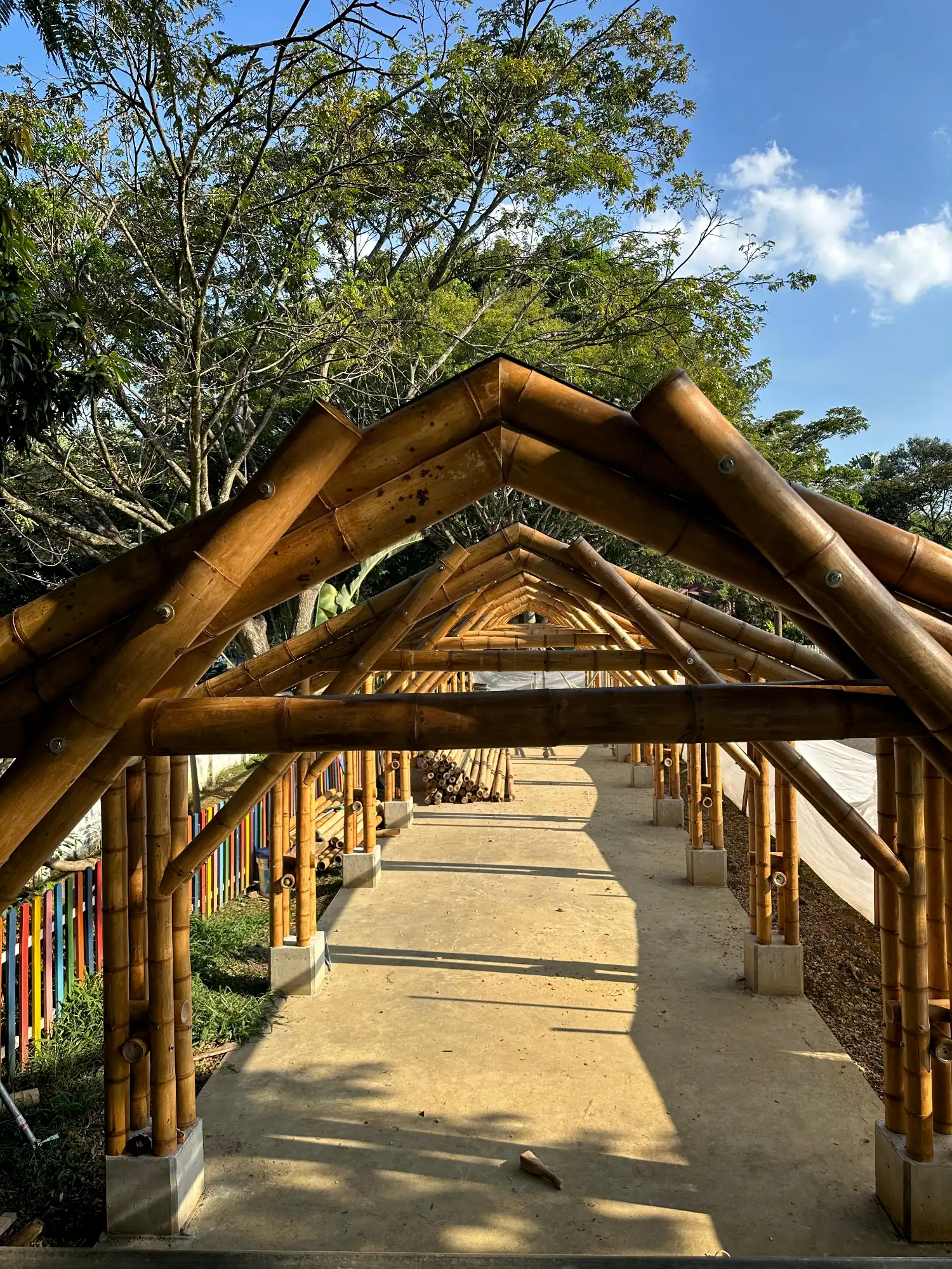 Lifting the prefabricated bamboo structures into position on site
