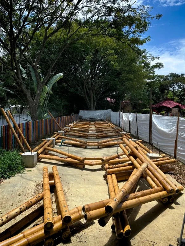 Assembling prefabricated bamboo trusses on the ground prior to installation